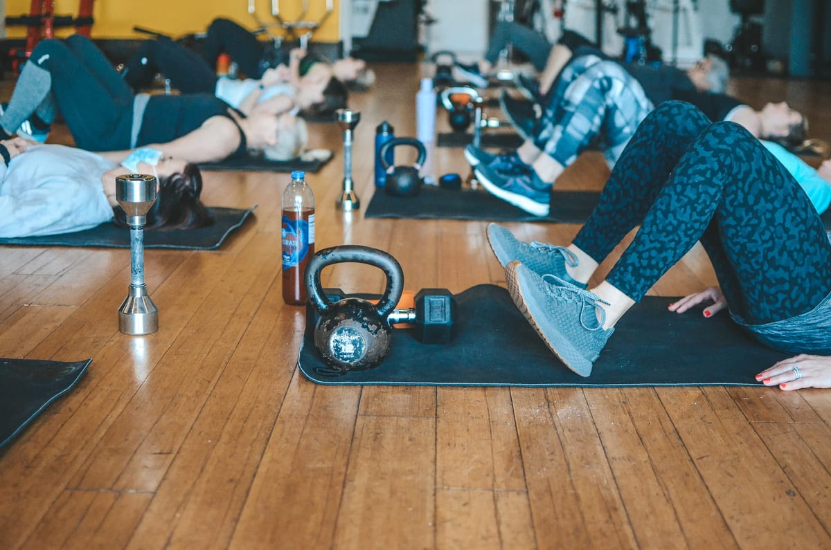 Members in a strength-training class format